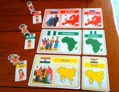 several cards with pictures of people and countries on them