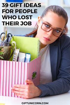 a woman holding a binder with the title 39 gift ideas for people who lost their job