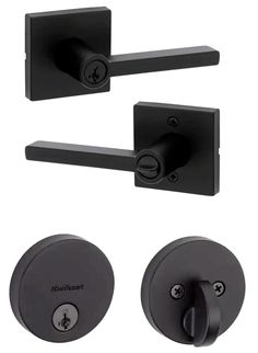 an image of two door handles and knobs on a white background with black hardware