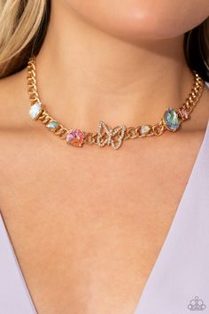 A succession of various gleaming, multicolored gems encased in gold fittings are affixed to a high-sheen, thick gold curb chain, adding dramatic dimension and color to an industrial statement. An airy gold butterfly frame adorned in white rhinestones is featured on the center of the gold curb chain for a touch of whimsicality. Features an adjustable clasp closure. Due to its prismatic palette, color may vary. Sold as one individual necklace. Includes one pair of matching earrings. Gold Curb Chain, Butterfly Necklace Gold, Palette Color, Butterfly Frame, Life Of The Party, Paparazzi Accessories, White Rhinestone, Latest Jewellery, Gold Butterfly