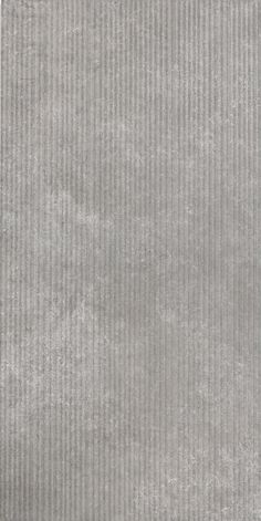 a gray rug with vertical stripes on it