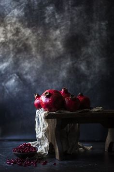 some pomegranates are sitting on a table