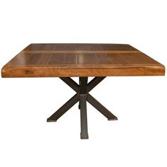 a wooden table with metal legs and a square shaped design on the top, against a white background