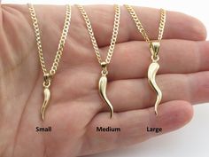 "Fabulous 14k Solid Yellow Gold Italian Horn Necklace Material: 14k Gold , Stamped on the horn and the chain Available size: Small , Medium , Large Small size = 3/4\" long not including the bail by 4 mm wide Medium size = 1\" long not including the bail by 5 mm wide Large size = 1 1/4\" long not including the bail by 6 mm wide Available lengths: 16\" , 18\", 20\", 24\" Cuban chain , 2.6 mm wide Length and avg weight: Small: 16\"= 5.3 grams , 18\"= 5.8 grams, 20\"= 6.1 grams, 24\"= 7.3 grams Medi Italian Horn Necklace, Italian Horn, Horn Necklace, The Horn, Cuban Chain, Fine Jewellery Necklace, Solid Yellow, Medium Size, Charm Necklace