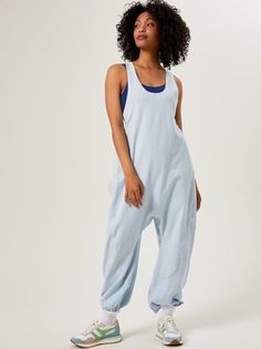 Adding a new spin to a classic harem style one-piece, this soft jumpsuit brings a touch of street style to your athleisure comfort. With a cinched back design, oversized pants pockets, and a scoop neckline, this slouchy one-piece is a endlessly comfortable pick for travel days on-the-go or lounging and leisure. Oversized Pants, Tennis Workout, Skirts With Boots, Top Dress, Dress First, The Court, Dress With Boots, Scoop Neckline, Athleisure