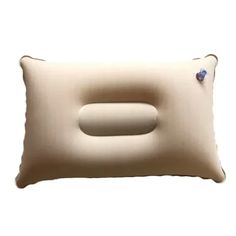 an inflatable pillow is shown on a white background with a blue bead