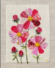 a close up of a piece of cloth with flowers on it and one flower in the middle