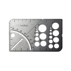 a metal ruler with holes on it