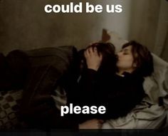 a man and woman laying in bed with the caption if you could be us please