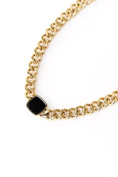 The Onyx Necklace effortlessly enhances your ensemble and adds a sense of allure.The deep black hue of the onyx stone creates a striking contrast against the radiant gold or silver, adding a touch of drama to your look. Pair it with the Onyx Ring or Onyx Bracelet for a full look Materials: Titanium Steel, 14k-Gold Filled, Details: 17 inch length, 1 cm link size Black Metal Jewelry With Chunky Chain, Elegant Onyx Necklace With Black Enamel, Luxury Black Chain Necklace, Formal Black Onyx Necklace, Modern Black Jewelry With Black Enamel, Trendy Black Jewelry With Gold Chain, Modern Gold Onyx Jewelry, Black Metal Jewelry With Adjustable Chain, Modern Gold Necklace With Black Enamel