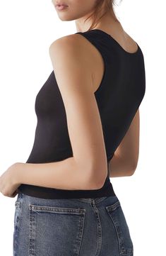 A more sculpted, muscle-fit cami is made in a seamless construction that looks great on its own or layered. 19" length (size M/L) Scoop neck 92% nylon, 8% spandex Machine wash, dry flat Made in the USA Fitted Tank Vest With Built-in Bra, Chic High Stretch Tank Top With Built-in Bra, Fitted Black Seamless Crop Top, Sleek Tops With Built-in Bra And Scoop Neck, Fitted Black Tank Top With Built-in Bra, Black Stretch Vest With Built-in Bra, Chic High Stretch Seamless Tank Top, Chic Seamless High Stretch Tank Top, Chic Seamless Second-skin Top