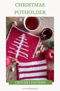 a crocheted christmas potholder with coffee and nuts on the table next to it