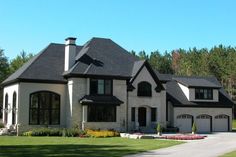 a large white house with lots of windows