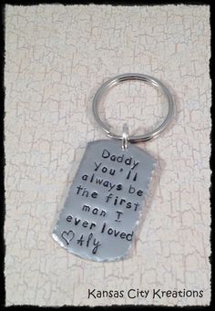 a keychain with a quote on it that says daddy you'll always be the first man i ever loved