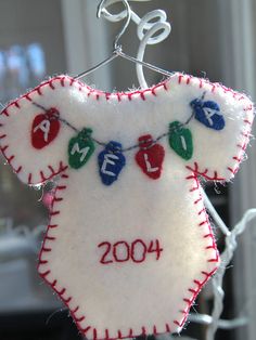 a christmas ornament hanging from a wire