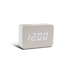 an alarm clock with the time displayed on it's display screen, in front of a white background