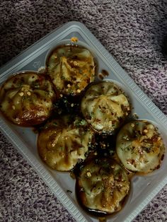 some food is sitting on a plastic tray