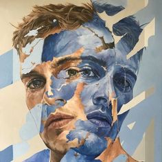 a painting of a man's face with blue paint on it