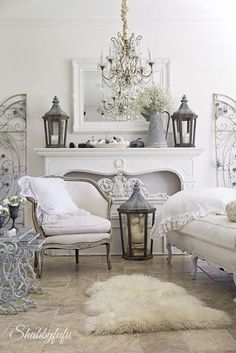 a living room filled with furniture and a chandelier