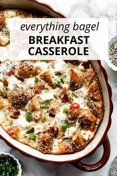 a casserole dish with cheese and vegetables in it on a marble counter top