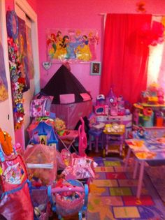 a room filled with lots of toys and furniture