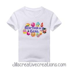 the birthday girl t - shirt is white and has cartoon characters on it