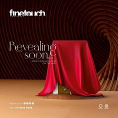 the cover of fine art magazine reveals a red cloth draped over a wooden stand in front of an abstract background