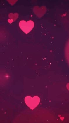 many pink hearts floating in the air on a purple background with stars and sparkles