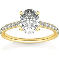 a yellow gold engagement ring with an oval cut diamond