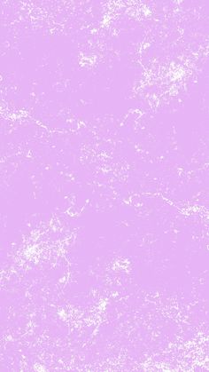 a pink background with white speckles on it