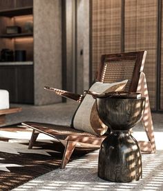 a wooden chair sitting on top of a rug