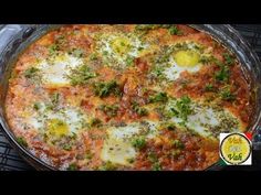 an omelet is sitting on top of the grill