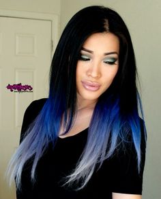 a woman with long black and blue hair