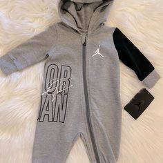 New With Tags!! Air Jordan Baby Onesie.. Size 3 Month. Love Love Love This Little Air Jordan Onesie!!! So Soft! 22-24.5 In 10-14.5 Lbs Nike Baby Clothes, Nike Romper, Nike Onesie, Grey One Piece, Ruffle Bodysuit, Baby Jumpsuit, Lil Baby, One Piece Outfit, Long Sleeve Jumpsuit