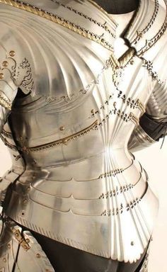 a close up of a person in armor