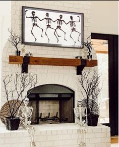 Farmhouse Brick Fireplace with Metal Mantel  Brackets Empty Fireplace Ideas, Mantel Corbels, Farmhouse Mantel, Halloween Mantle Decor, Painted Brick Fireplaces, Wooden Mantel, Mantel Surround, Halloween Mantle