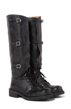 A split-shaft design bridged with adjustable straps allows various styling options for this moto-inspired tall boot that was featured on the label's fall '24 runway. 1 1/2" (38mm) heel Lace-up style; adjustable straps with buckle closure Leather upper, lining and sole Made in Italy Designer Shoes Boots Lace Up, Ann Demeulemeester Boots, Steel Boots, Tall Lace Up Boots, Fall 24, Tall Boot, Tall Boots, Lace Boots, Boot Shoes Women