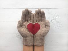 "Perfect wool gloves for your wife, girlfriend, mom, best friend or for yourself for Christmas, Valentine's Day, Holiday, anniversary, birthday, etc. These taupe mittens with heart are \"one size fits all\" type, but please ask me about the size if you hesitate or if the hands are too big or too small. These heart gloves are made of high quality wool. They are soft & warm and the felted application is hand stitched. Please hand wash in lukewarm water and lay flat to dry. Fingerless option: h Heart Gloves, Beige Gloves, Grey Gloves, Handmade Birthday Gifts, Valentine Gifts For Girlfriend, Wool Gloves, Wool Mittens, Gift Girlfriend, Knitting Gift