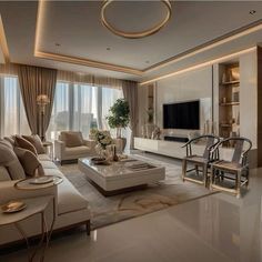 a living room filled with furniture and a flat screen tv