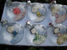 six glass ornaments in the shape of charlie brown's christmas ornament