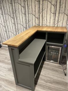 an office desk with a built in cabinet