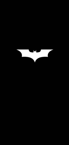 the dark knight rises logo in silhouette on a black background, with only one bat visible