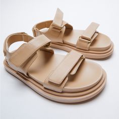 Genuine Zara New With Tag Material: Leather Upper Color: Beige Summer Leather Sandals With Elevated Luxury Vibes. Love Neutral Color To Go With Most Outfits. Comfortable Wide Footbed With Adjustable Straps. Euro Size 37(6.5), 39(8) Beige Footbed Sandals With Adjustable Strap For Summer, Beige Adjustable Strap Footbed Sandals For Summer, Beige Double Strap Sandals For Summer, Beige Double Strap Footbed Sandals For Summer, Spring Beige Leather Footbed Sandals, Leather Footbed Sandals In Beige For Spring, Chic Leather Footbed Sandals For Day Out, Chic Summer Double Strap Footbed Sandals, Chic Double Strap Footbed Sandals For Spring