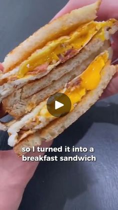 a person holding a sandwich in their hand with the words, so i turned it into a breakfast sandwich