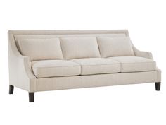 a white couch sitting on top of a wooden floor