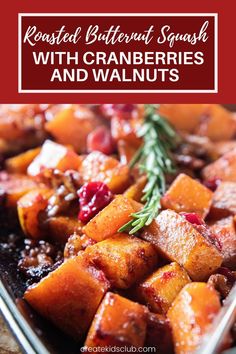 roasted butternut squash with cranberries and walnuts on a serving platter