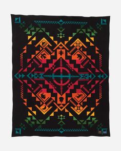 a black blanket with an abstract design on the front and back, featuring colorful geometric shapes