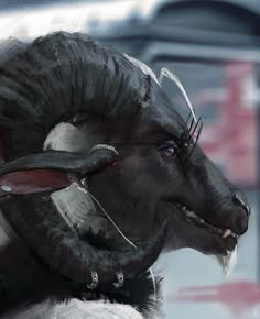 an animal with horns and piercings on it's head