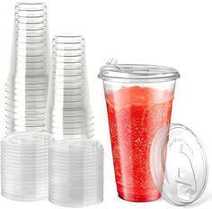 plastic cups with lids and straws on white background