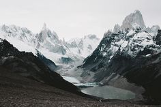 the mountains are covered in snow and ice